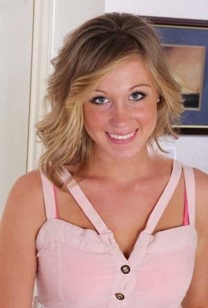 Smiling coed Ashley Jones gets naked for the very first time on fanspics.com