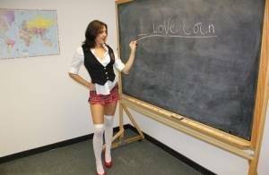 Naughty schoolgirl Cherry Poppins seduces a fellow student in slut wear on fanspics.com