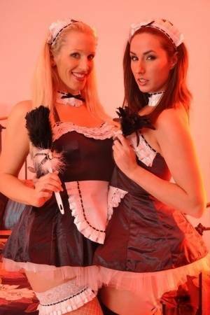 British maids Paige Turnah & Rebecca More have lesbian sex on a bed - Britain on fanspics.com