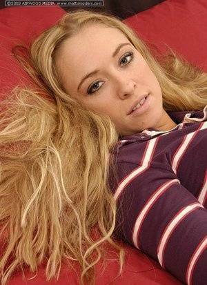 Blonde amateur Amber uncups A-cups tits before fingering her naked pussy on fanspics.com