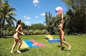 Big ass latina sluts with big tits and asses are undressing outdoor on fanspics.com