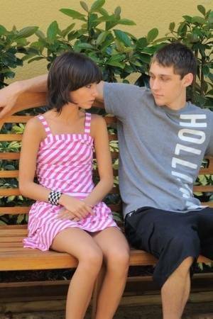 Clothed teen girl Mishka gives her stepbrother a kiss before sucking his cock on fanspics.com