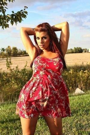 Amateur solo girl Briana Lee flashes her tits and twat in the countryside on fanspics.com