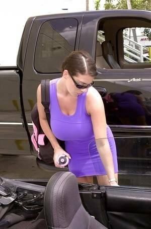 Linsey Dawn McKenzie shows her upskirt area in the car. on fanspics.com