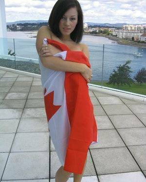 Teen amateur Kate wraps her naked body up in a Canadian flag on fanspics.com