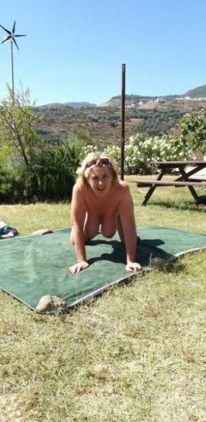 Mature amateur sports a creampie after sex atop a picnic table on fanspics.com