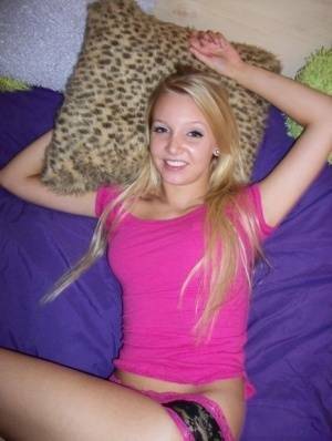 Cute teen girl with blonde hair shows off her tits and twat for the first time on fanspics.com