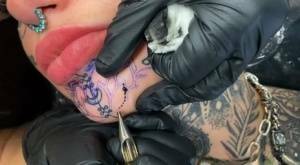 Tattoo enthusiast Amber Luke gets a new face tat from a female artist on fanspics.com