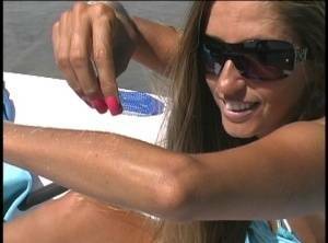 Amateur model Lori Anderson exhibits her hairy forearms in sunglasses on fanspics.com