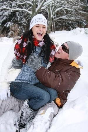 Teen girl opens her mouth for a cumshot after fucking in the snow on fanspics.com