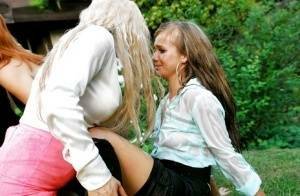 Lusty european sluts have some fully clothed pissing fun with a inky lad on fanspics.com