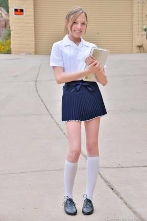 Delicious blonde schoolgirl likes spreading her twat and ramming it on fanspics.com