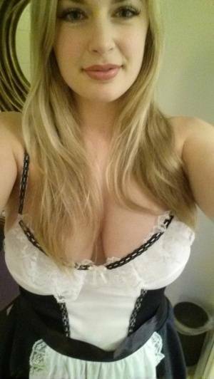 Big assed blonde amateur Danielle takes candid selfies all around the world on fanspics.com