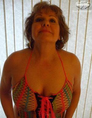 Mature woman Busty Bliss wears see thru attire during POV action on fanspics.com