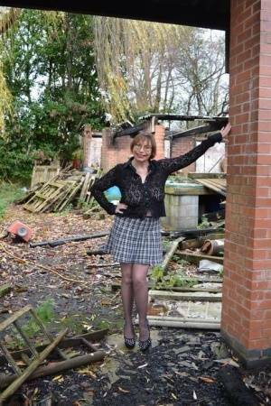 Amateur chick Barby Slut strips to her heels on a demolition site on fanspics.com