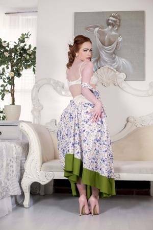 Solo model Ella Hughes releases her nice ass from vintage lingerie on fanspics.com