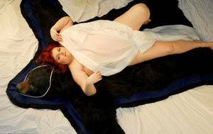 Fat redhead Black Widow AK models totally naked on a bearskin rug on fanspics.com