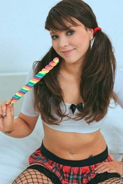 Naughty Babe Natalia Forrest Poses In Her Stockings And Sucks On A Lollipop To Make Us Sweat on fanspics.com