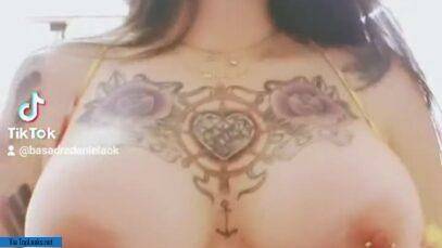 Topless sex model dances another TikTok trend with fake boobs on fanspics.com