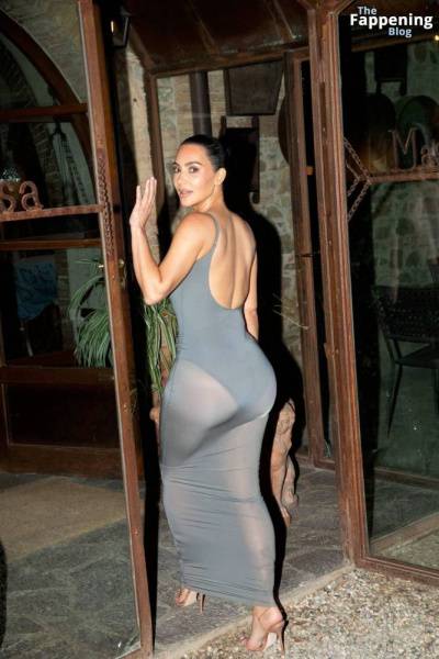 Kim Kardashian Shows Off Her Assets in a Sheer Dress (14 Photos) on fanspics.com