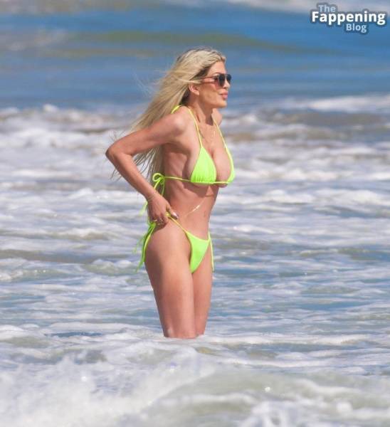 Tori Spelling Looks Smoking Hot in a Bikini as She Hits the Beach in Malibu (24 Photos) on fanspics.com
