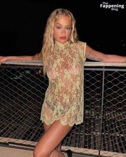 Rita Ora Shows Off Her Nude Boobs While Posing in a Sheer Dress (2 Photos) on fanspics.com